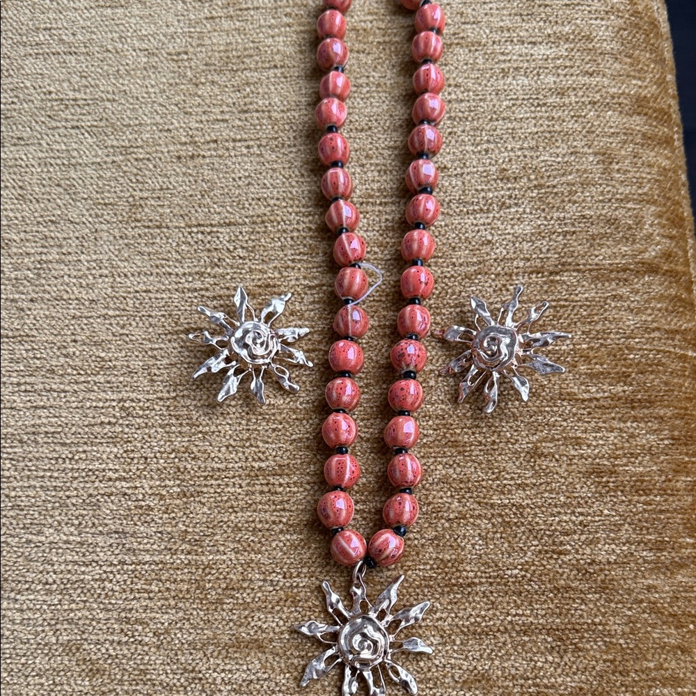 Mango orange tone Beaded Necklace with gold tone Sunburst Charms